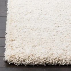 Safavieh Compton Collection Ivory Solid Shag Runner Rug - 2' x 8'