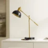 Safavieh Amur 24" Table Lamp with USB Port in Black and Brass 1 Safavieh Amur 24" Table Lamp with USB Port in Black and Brass -Safavieh Furniture GUEST 0864d28c cf48 4d22 b7ed ffcb47e224dd