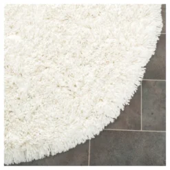 Safavieh Flora Shag 4' Round White Tufted Accent Rug