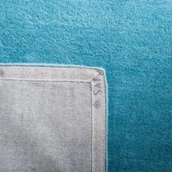 Safavieh Mandy Hand-Tufted Solid Pure Wool Area Rug -Safavieh Furniture GUEST 21f4f61a 8789 415a ac3b 806e4c8e405e