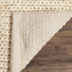 Safavieh Carlene Solid Woven Natural Fiber Jute Rug 11 Safavieh Carlene Solid Woven Natural Fiber Jute Rug -Safavieh Furniture GUEST 5a814e5d b176 43f7 aa2d 120db3097f38