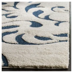 Safavieh Dahy Artful Sculpted Shag Area Rug