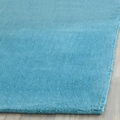 Safavieh Mandy Collection Turquoise Tufted Wool Runner Rug, 2'3" x 12' 4 Safavieh Mandy Collection Turquoise Tufted Wool Runner Rug, 2'3" x 12' - Image 2