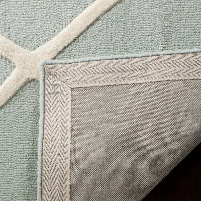 Safavieh Kids SFK906 Hand Tufted Wool Area Rug for Playrooms & Nurseries 5 Safavieh Kids SFK906 Hand Tufted Wool Area Rug for Playrooms & Nurseries - Image 3