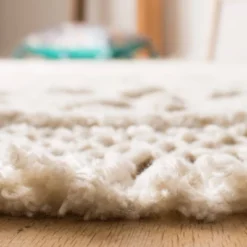 Safavieh Darleen Ivory Area Rug with Elegant Tassel Fringe -Safavieh Furniture GUEST ca917864 1e2c 4da0 90ad e5cc2590d93c