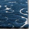 Safavieh Elaina Collection Swirl Loomed Accent Rug - 2'3" x 4' Dark Blue/Cream -Safavieh Furniture GUEST ca9bbcb6 51e7 4060 b08b 17c1e1c64cd2