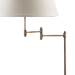 Safavieh Ingram Swing Arm Floor Lamp in Brass Finish - LIT4301 -Safavieh Furniture GUEST cbe03861 9c77 4f20 8f27 7e2a76c17165