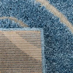 Safavieh Elaina Swirl Loomed Shag Runner Rug, Light Blue/Cream (2'3" x 11') 11 Safavieh Elaina Swirl Loomed Shag Runner Rug, Light Blue/Cream (2'3" x 11') -Safavieh Furniture GUEST e27f8e45 6b92 4f76 b2a4 94876168a2c7