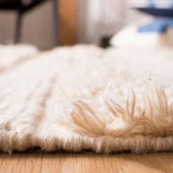 Safavieh Joseph Rug: Hand-Tufted Moroccan Shag Area Rug -Safavieh Furniture GUEST e8cf96b0 dc1e 4985 aaa6 f86066f4ac9b